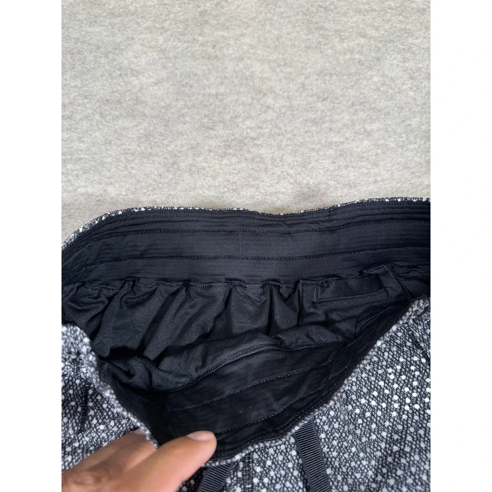 Lululemon Running Shorts Womens 4 Black Lined Zip Pocket Split‎ Hem Athletic